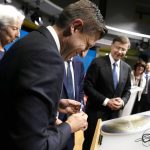 
              Croatia's Finance Minister Zdravko Maric, second left, signs a cardboard euro coin after a signing ceremony for Croatia to join the euro in Brussels, Tuesday, July 12, 2022. The European Union is set on Tuesday to remove the final obstacles for Croatia to adopt the euro, ensuring the first expansion of the currency bloc in almost a decade. (AP Photo/Virginia Mayo)
            