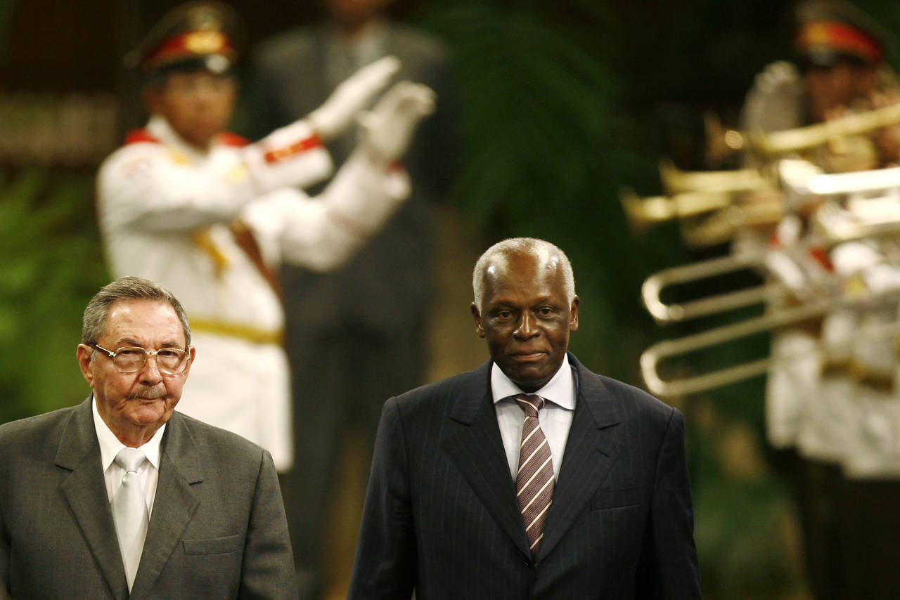 CAPTION CORRECTS AGE -FILE - Cuba's acting President Raul Castro, left, and Angola's President Jose...