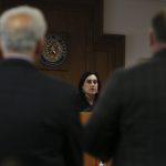 
              Judge Maya Guerra Gamble speaks to Alex Jones during his trial at the Travis County Courthouse in Austin, Texas, Tuesday, July 26, 2022. An attorney for the parents of one of the children who were killed in the Sandy Hook Elementary School shooting told jurors that Jones repeatedly “lied and attacked the parents of murdered children” when he told his Infowars audience that the 2012 attack was a hoax. Attorney Mark Bankston said during his opening statement to determine damages against Jones that Jones created a “massive campaign of lies” and recruited “wild extremists from the fringes of the internet ... who were as cruel as Mr. Jones wanted them to be" to the victims' families. Jones later blasted the case, calling it a “show trial” and an assault on the First Amendment. (Briana Sanchez/Austin American-Statesman via AP, Pool)
            