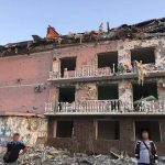 
              In this photo provided by the Odesa Regional Prosecutor's Office, a damaged residential building is seen in Odesa, Ukraine, early Friday, July 1, 2022, following Russian missile attacks. Ukrainian authorities said Russian missile attacks on residential buildings in the port city of Odesa have killed more than a dozen people. (Ukrainian Emergency Service via AP)
            
