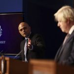 
              FILE - Britain's Health Secretary Sajid Javid, left, and Prime Minister Boris Johnson during a media briefing on the COVID-19 pandemic, in Downing Street, London, Nov. 30, 2021. Two of Britain’s most senior Cabinet ministers have quit on Tuesday, July 5, 2022, a move that could spell the end of Prime Minister Boris Johnson’s leadership after months of scandals. Treasury chief Rishi Sunak and Health Secretary Sajid Javid resigned within minutes of each other. Javid said “I can no longer continue in good conscience.” (Tom Nicholson/Pool Photo via AP, file)
            