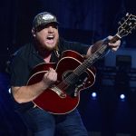
              FILE - Luke Combs performs during CMA Fest 2022 in Nashville, Tenn., on June 11, 2022. Comb's latest album, "Growin' Up," releases Friday, July 1. (Photo by Amy Harris/Invision/AP, File)
            