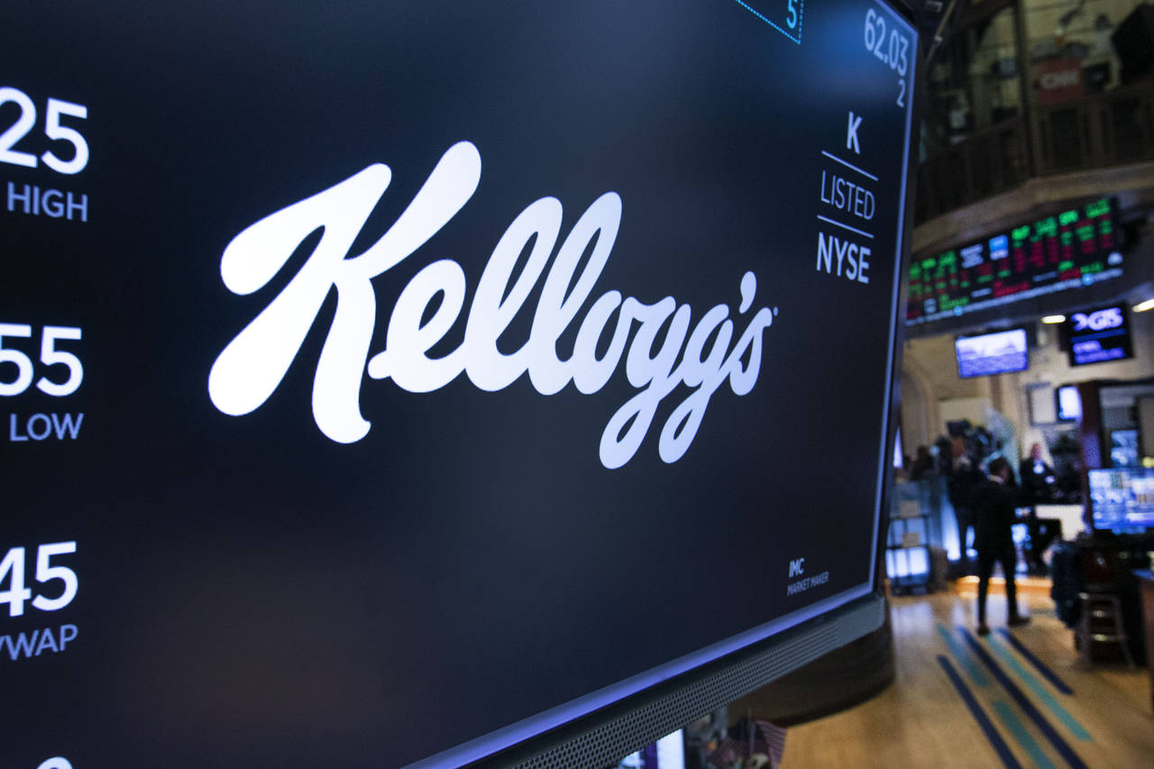 FILE - The logo for Kellogg's appears above a trading post on the floor of the New York Stock Excha...