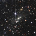 
              This image provided by NASA on Monday, July 11, 2022, shows galaxy cluster SMACS 0723, captured by the James Webb Space Telescope. The telescope is designed to peer back so far that scientists can get a glimpse of the dawn of the universe about 13.7 billion years ago and zoom in on closer cosmic objects, even our own solar system, with sharper focus. (NASA, ESA, CSA, STScI via AP)
            