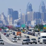 
              Travelers move along Interest 95 ahead of the Independence Day holiday weekend in Philadelphia, Friday, July 1, 2022. (AP Photo/Matt Rourke)
            