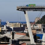 
              FILE - A Wednesday, Aug. 15, 2018 file photo showing a view of the Morandi highway bridge that collapsed in Genoa, northern Italy. Fifty-nine people went on trial Thursday, July 7, 2022, for the 2018 collapse of Genoa's Morandi bridge, accused of manslaughter and other charges in the deaths of 43 people. (AP Photo/Antonio Calanni, File)
            