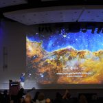 
              Michael Ressler, Project Scientist for the JWST Mid-Infrared Instrument, speaks in front of an image of the Carina Nebula, captured on the James Webb Space Telescope, during a news conference at the NASA Jet Propulsion Laboratory Tuesday, July 12, 2022, in Pasadena, Calif. (AP Photo/Marcio Jose Sanchez)
            