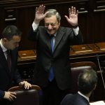 
              Italian Premier Mario Draghi waves to lawmakers at the end of his address at the Parliament in Rome, Thursday, July 21, 2022. Premier Mario Draghi's national unity government headed for collapse Thursday after key coalition allies boycotted a confidence vote, signaling the likelihood of early elections and a renewed period of uncertainty for Italy and Europe at a critical time. (AP Photo/Andrew Medichini)
            