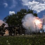 
              Ukrainian servicemen shoot with SPG-9 recoilless gun during training in Kharkiv region, Ukraine, Tuesday, July 19, 2022. (AP Photo/Evgeniy Maloletka)
            