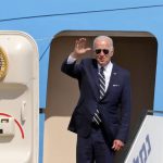 
              U.S. President Joe Biden waves before his departure to Saudi Arabia from Ben Gurion airport in Lod near Tel Aviv, Israel Friday, July 15, 2022. (Abir Sultan/Pool Photo via AP)
            