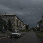 
              FILE A man drives his car on a street in Kramatorsk, eastern Ukraine, Thursday, July 14, 2022. Ukrainians living in the path of Russia's invasion in the besieged eastern Donetsk region are bracing themselves for the possibility that they will have to evacuate. (AP Photo/Nariman El-Mofty, File)
            