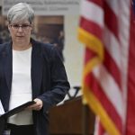 
              Summit County Medical Examiner Dr. Lisa Kohler walks to the podium to discuss the results of a preliminary autopsy she conducted on Jayland Walker during a press conference at the Summit County Board of Health office, Friday, July 15, 2022, in Akron, Ohio. (AP Photo/David Dermer)
            