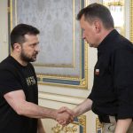 
              In this image provided by the Ukrainian Presidential Press Office, Ukrainian President Volodymyr Zelenskyy, left, and Defense minister of Poland Mariusz Blaszczak shake hands during their meeting in Kyiv, Ukraine, Tuesday, July 12, 2022. (Ukrainian Presidential Press Office via AP)
            