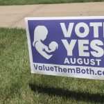 
              FILE - In this photo from Friday, July 8, 2022, a sign in a yard in Olathe, Kansas, promotes a proposed amendment to the Kansas Constitution to allow legislators to further restrict or ban abortion. Supporters call the measure "Value Them Both," arguing that it protects both unborn children and the women carrying them. Alabama, Arizona, Georgia, Kansas and Missouri all have personhood laws. (AP Photo/John Hanna, File)
            