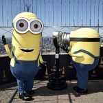 
              Minion characters Kevin, left, and Bob pose on the 86th floor observatory deck at the Empire State Building to celebrate the upcoming film "Minions: The Rise of Gru" on Tuesday, June 28, 2022, in New York. (Photo by Evan Agostini/Invision/AP)
            