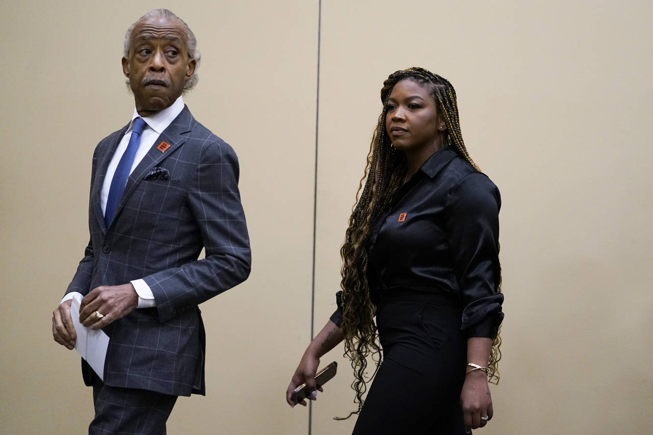 The Rev. Al Sharpton, left, and Cherelle Griner attend a news conference in Chicago, Friday, July 8...