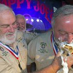 
              In this photo provided by the Florida Keys News Bureau, Joe Maxey, the 2019 "Papa" Hemingway Look-Alike Contest winner, smashes birthday cake on the face of Zach Taylor, the 2021 winner, on the 123rd anniversary of Ernest Hemingway's birthday Thursday, July 21, 2022, at Sloppy Joe's Bar in Key West, Fla. The antics preceded the first round of the 2022 Hemingway Look-Alike Contest that is a part of the subtropical island's annual Hemingway Days festival. (Andy Newman/Florida Keys News Bureau via AP)
            