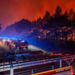 
              This photo provided by the fire brigade of the Gironde region (SDIS 33) shows firefighters fighting wildfire near Landiras, southwestern France, Sunday July 17, 2022 . Firefighters battled wildfires raging out of control in France and Spain on Sunday as Europe wilted under an unusually extreme heat wave that authorities in Madrid blamed for hundreds of deaths. (SDIS 33 via AP)
            