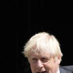 
              Britain's Prime Minister Boris Johnson leaves 10 Downing Street to attend the weekly Prime Ministers' Questions session in parliament in London, Wednesday, July 20, 2022. (AP Photo/Frank Augstein)
            