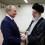 
              In this picture released by the official website of the office of the Iranian supreme leader, Supreme Leader Ayatollah Ali Khamenei, right, and Russian President Vladimir Putin greet each other during their meeting in Tehran, Iran, Tuesday, July 19, 2022. (Office of the Iranian Supreme Leader via AP)
            