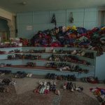 
              Clothes and shoes on display to be distributed to people, at the humanitarian aid headquarters, in Kramatorsk, Ukraine, Tuesday, July 5, 2022. (AP Photo/Nariman El-Mofty)
            
