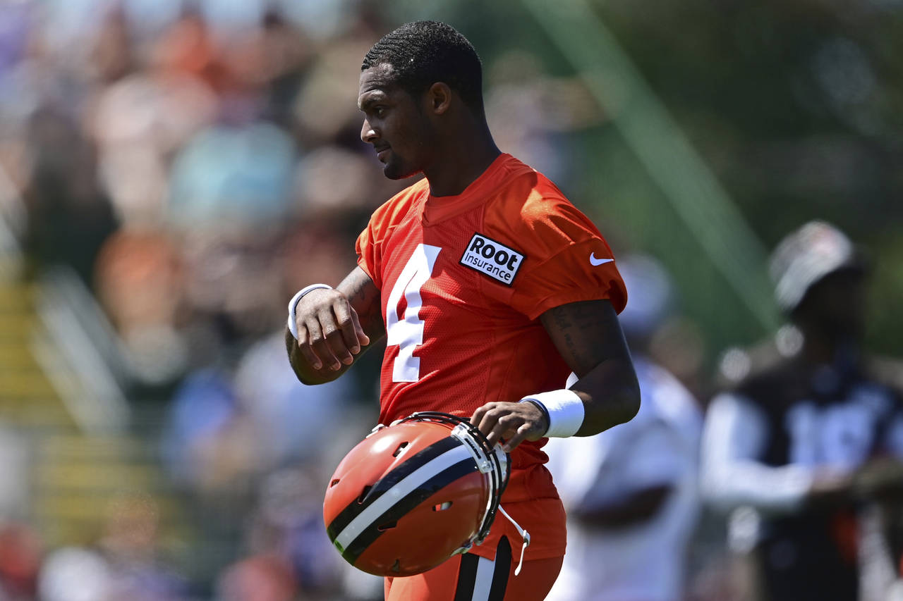 Cleveland Browns quarterback Deshaun Watson walks during an NFL football practice in Berea, Ohio, S...