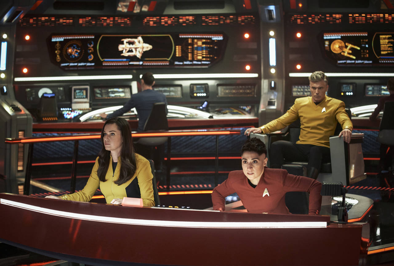 This image released by Paramount+ shows, from left, Rebecca Romijn as Una, Ethan Peck as Spock, bac...