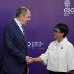 
              Indonesian Foreign Minister Retno Marsudi, right, greets Russian Foreign Minister Sergey Lavrov upon arrival at the G20 Foreign Ministers' Meeting in Nusa Dua, Bali, Indonesia, Friday, July 8, 2022. (AP Photo/Dita Alangkara, Pool)
            