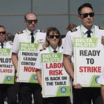 
              Off-duty Delta Air Lines pilots picket at Salt Lake City International Airport Thursday, June 30, 2022, in Salt Lake City.  Airlines that have stumbled badly over the last two holidays face their biggest test yet of whether they can handle big crowds when July Fourth travelers mob the nation's airports this weekend.
Problems were popping up well before the weekend, with some disruptions caused by thunderstorms that slowed air traffic. (AP Photo/Rick Bowmer)
            