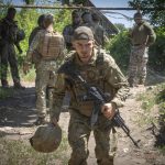 
              Ukrainian soldiers attend their positions, in the Donetsk region, Ukraine, Saturday, July 2, 2022. (AP Photo/Efrem Lukatsky)
            