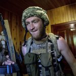
              A Ukrainian serviceman prepares to go on duty to his position at the frontline near Kharkiv, Ukraine, on Saturday, July 2, 2022. (AP Photo/Evgeniy Maloletka)
            