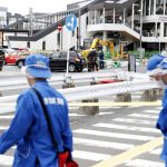
              Investigators work near the site of gunshots in Nara, western Japan Friday, July 8, 2022. Japan’s former Prime Minister Shinzo Abe was in heart failure after apparently being shot during a campaign speech Friday in western Japan, NHK public television said Friday. (Kyodo News via AP)
            