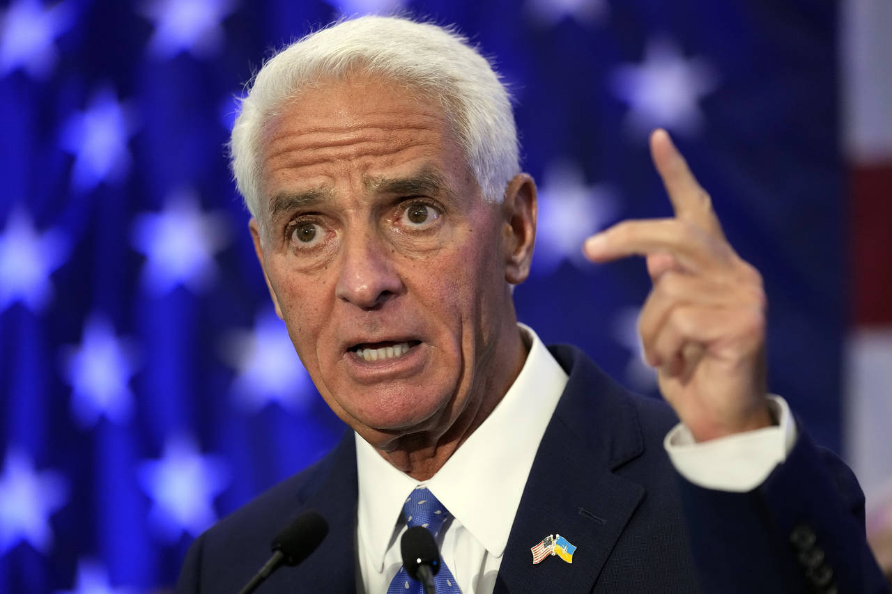 Rep Charlie Crist, D-Fla., gestures after declaring victory Tuesday, Aug. 23, 2022, in St. Petersbu...