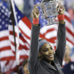 
              FILE - Serena Williams holds up the championship trophy after defeating Victoria Azarenka, of Belarus, during the women's singles final of the 2013 U.S. Open tennis tournament, Sunday, Sept. 8, 2013, in New York. The U.S. Open, the year’s last Grand Slam tennis tournament, starts Monday. Williams has indicated this will be the last event of her playing career.
(AP Photo/David Goldman, File)
            