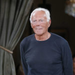 
              FILE - Designer Giorgio Armani accepts applause at the end of the Armani Haute Couture Fall-Winter 2018/2019 fashion collection presented Tuesday, July 3, 2018 in Paris. Firefighters are putting out the remnants of two wildfires on a Sicilian island that forced fashion designer Giorgio Armani and dozens more to flee vacation villas overnight. The head of the region’s civil protection agency said Thursday, Aug. 18, 2022 that arson is suspected in two wildfires that forced some 30 people to seek refuge in boats or on safer parts of the island. (AP Photo/Michel Euler, File)
            