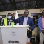 
              Deputy President and presidential candidate William Ruto casts his vote in Kenya's general election in Sugoi, 50 kms (35 miles) north west of Eldoret, Kenya, Tuesday Aug. 9, 2022. Kenyans are voting to choose between opposition leader Raila Odinga and Ruto to succeed President Uhuru Kenyatta after a decade in power. (AP Photo/Brian Inganga)
            