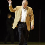 
              FILE - Len Dawson is introduced before the inaugural Pro Football Hall of Fame Fan Fest Friday, May 2, 2014, at the International Exposition Center in Cleveland. Hall of Fame quarterback Len Dawson, who helped the Kansas City Chiefs to a Super Bowl title, died Wednesday, Aug. 24, 2022. He was 87. (AP Photo/Mark Duncan, File)
            