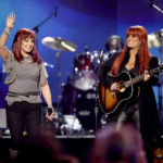 
              FILE - Naomi Judd, left, and Wynonna Judd, of The Judds, perform at the "Girls' Night Out: Superstar Women of Country," in Las Vegas, April 4, 2011. Judd's family filed a court petition Friday to seal police reports and recordings made during the investigation into her death. The family said the records contain video and audio interviews with relatives in the immediate aftermath of her death and releasing such details would inflict "significant trauma and irreparable harm.” Judd died at the age of 76 on April 30 at her home in Tennessee. (AP Photo/Julie Jacobson, File)
            