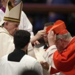 
              New Cardinal Arthur Roche receives the red three-cornered biretta hat from Pope Francis during a consistory inside St. Peter's Basilica, at the Vatican, Saturday, Aug. 27, 2022. Pope Francis has chosen 20 men to become the Catholic Church's newest cardinals. (AP Photo/Andrew Medichini)
            