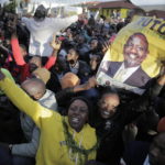 
              Supporters of Deputy President and presidential candidate William Ruto celebrate his victory over opposition leader Raila Odinga in Eldoret, Kenya, Monday, Aug. 15, 2022. Ruto received 50.49% of the vote, the chairman of the electoral commission said, while Odinga received 48.85%. (AP Photo/Brian Inganga)
            