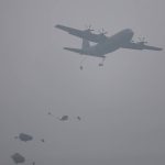 
              U.S soldiers parachute out of an airplane during the annual joint combat exercises in Baturaja, South Sumatra province, Indonesia, Wednesday, Aug 3, 2022. The United States and Indonesian militaries began their annual joint combat exercises Wednesday on Indonesia's Sumatra island, joined for the first time by partner nations, signaling stronger ties amid growing maritime activity by China in the Indo-Pacific region. (AP Photo)
            