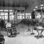 
              This photo provided by the Kenan Research Center at the Atlanta History Center shows the interior of A. F. Herndon's Barber Shop in Atlanta, Ga. Herndon was one of Atlanta’s first Black millionaires and his shop was one of the first business to be destroyed by white mobs during the 1906 Atlanta Race Massacre. Few have been taught about the massacre, which forced thousands from their homes and shaped the city’s geography, economy, society and power structure in lasting ways. (Courtesy of Kenan Research Center at the Atlanta History Center via AP)
            