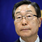 
              Tomihiro Tanaka, right, the President of Family Federation for World Peace and Unification poses prior to a press conference Wednesday, Aug. 10, 2022, in Tokyo. Tanaka denied any “political interference” with specific political parties and said Prime Minister Kishida’s call for his party members to distance themselves from the church was “regrettable.” Kishida reshuffled his Cabinet on Wednesday in an apparent bid to distance his administration from the Unification Church, whose ties to the assassinated leader Shinzo Abe and senior ruling party leadership caused a major drop in approval ratings. (AP Photo/Eugene Hoshiko)
            