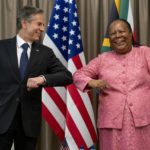 
              Secretary of State Antony Blinken is greeted by South Africa's Foreign Minister Naledi Pandor as he arrives for a meeting at the South African Department of International Relations and Cooperation in Pretoria, South Africa, Monday, Aug. 8, 2022. Blinken is on a ten day trip to Cambodia, Philippines, South Africa, Congo, and Rwanda. (AP Photo/Andrew Harnik, Pool)
            