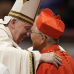 
              New Cardinal Lazzaro You Heung-Sik receives the red three-cornered biretta hat from Pope Francis during a consistory inside St. Peter's Basilica, at the Vatican, Saturday, Aug. 27, 2022. Pope Francis has chosen 20 men to become the Catholic Church's newest cardinals. (AP Photo/Andrew Medichini)
            