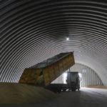 
              FILE - A dump track unloads grain in a granary in the village of Zghurivka, Ukraine, Tuesday, Aug. 9, 2022. A ship approached Ukraine on Friday, Aug. 12, 2022, to pick up wheat for hungry people in Ethiopia, in the first food delivery to Africa under a U.N.-brokered plan to unblock grain trapped by Russia’s war and bring relief to some of the millions worldwide on the brink of starvation. (AP Photo/Efrem Lukatsky, File)
            