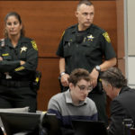 
              Marjory Stoneman Douglas High School shooter Nikolas Cruz speaks with capital defense attorney Casey Secor during a break in the penalty phase of Cruz's trial at the Broward County Courthouse in Fort Lauderdale, Fla., Tuesday, Aug. 30, 2022. Cruz previously plead guilty to all 17 counts of premeditated murder and 17 counts of attempted murder in the 2018 shootings. (Amy Beth Bennett/South Florida Sun Sentinel via AP, Pool)
            