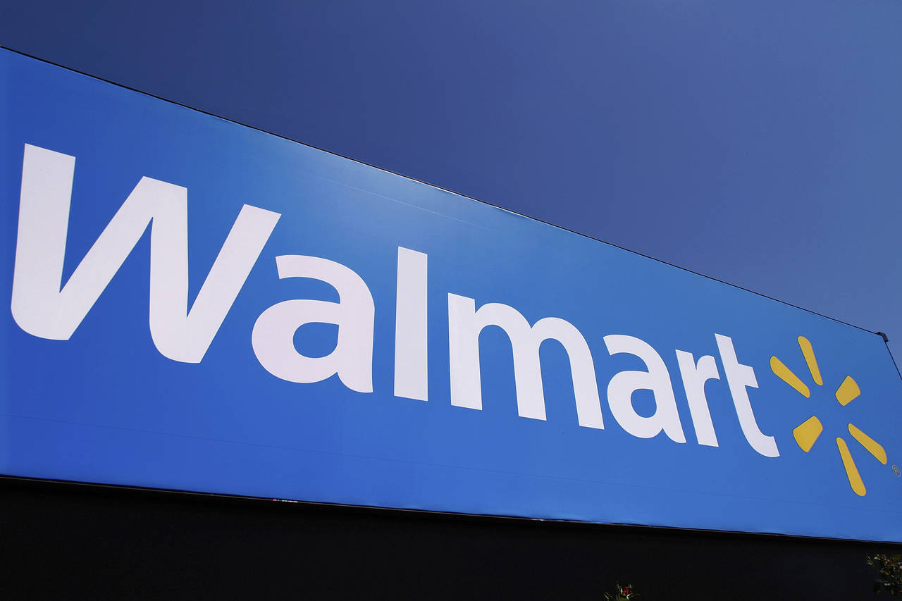 FILE - The Walmart logo is displayed on a store in Springfield, Ill., May 16, 2011. Walmart Inc. sa...