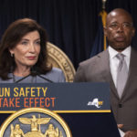 
              New York Gov.  Kathy Hochul, left, and New York City Mayor Eric Adams, right, attend a news conference about upcoming “Gun Free Zone" implementation at Times Square, Wednesday, Aug. 31, 2022, in New York. (AP Photo/Yuki Iwamura)
            