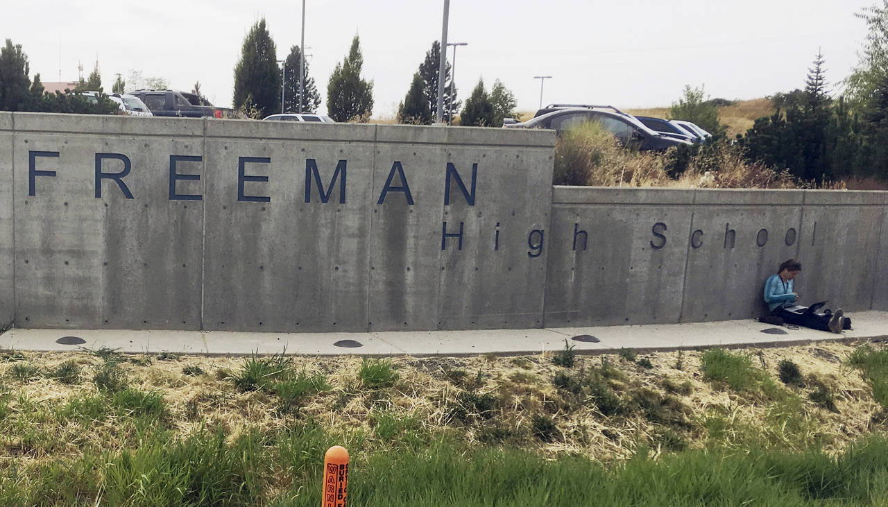 FILE - The sign for Freeman High School in Rockford, Wash., is seen outside the campus on Sept. 13,...